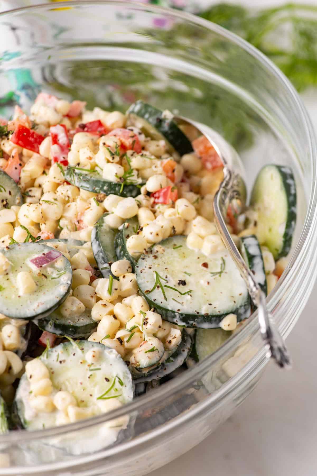 A clear bowl of ranch potato salad.