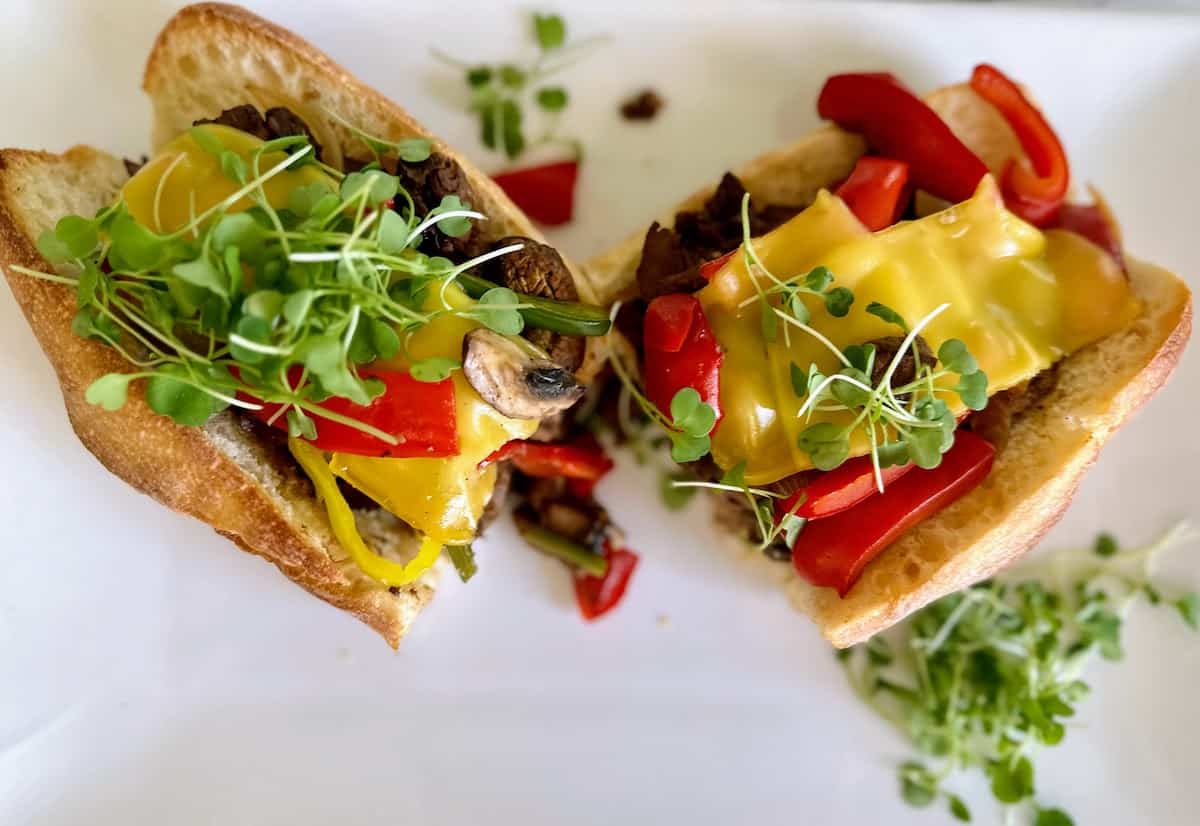 Steak Tips Recipe: Philly Cheese steak on a plate.