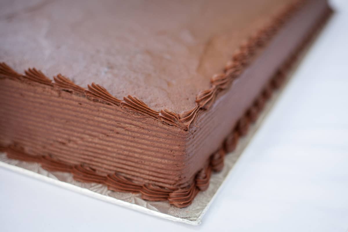 corner of a chocolate sheet cake